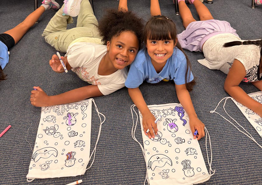 Elementary schoolers from RCCS at Bilingual summer camp doing after school enrichment activities